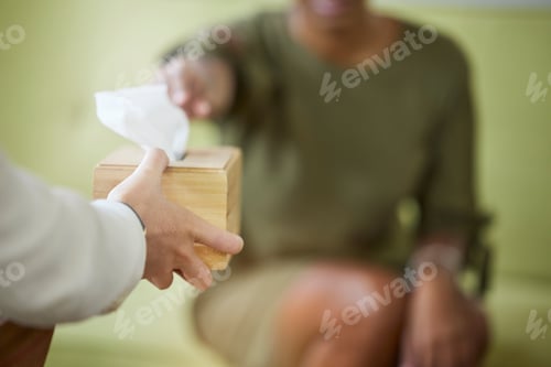 Preview: Therapist hands, tissue and black woman patient at therapy consultation for grief and depression. M