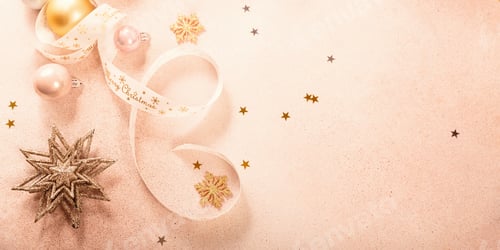 Preview: Festive Christmas and New Year background with gold and pink baubles and ribbons