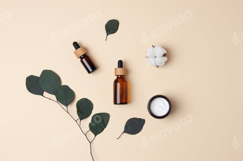 Preview: Cosmetic skin care products with and eucalyptus on pastel beige background. Flat lay