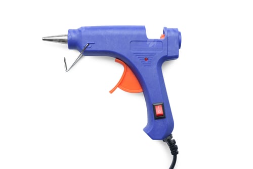Preview: Empty blue glue gun isolated on white, top view