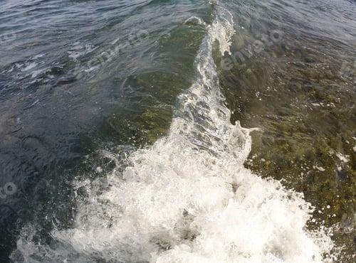 Preview: Photo of the sea waves on the background of sunrise or sunset