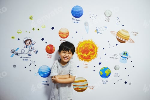 Preview: The little boy stood smiling as he dreamed of becoming an astronaut.