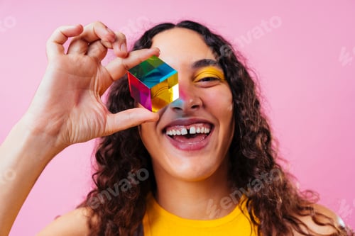 Preview: Creative studio portrait of beautiful hispanic woman with diastema