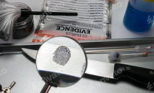 Preview: Police investigation of fingerprint on a knife, concept image