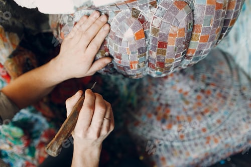 Preview: Man mosaics master in hat making smalt glass mosaic panel