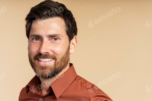 Preview: Handsome smiling middle aged man, handsome businessman looking at camera isolated on background