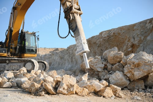 Preview: Excavator with hydraulic hammer on road construction works