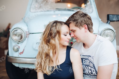 Preview: Lovely husband standing from back and embracing beautiful blonde woman