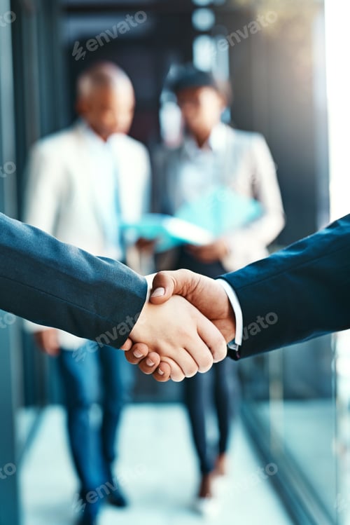 Preview: People will fear this partnership. Cropped shot of two businesspeople shaking hands.