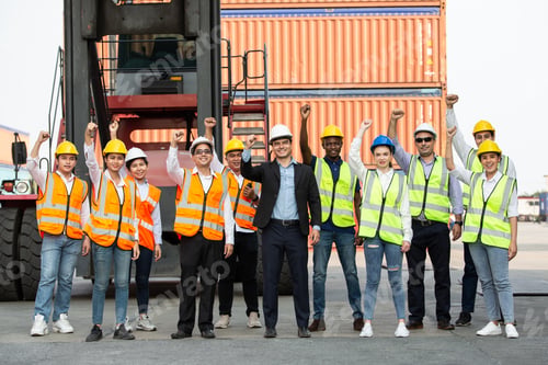 Preview: Group of logistic worker lifting hands up in the air for successful work