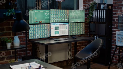Preview: Empty office with stock market prices changing on multiple monitors