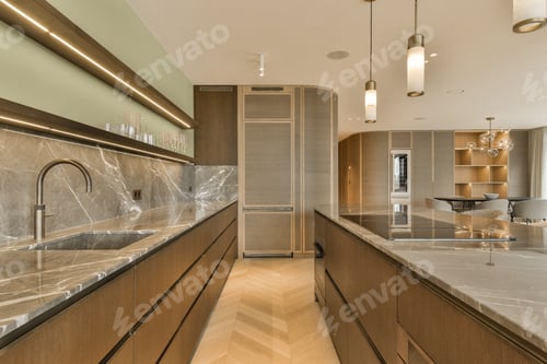 Preview: a large kitchen with marble counter tops and a sink