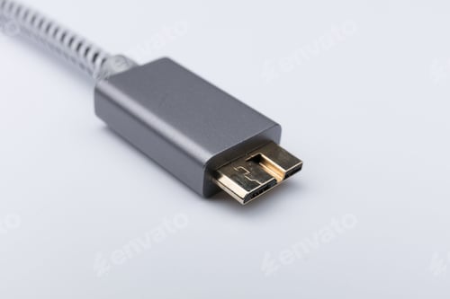 Preview: Grey USB cable on a white background