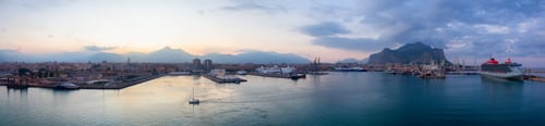 Preview: Industrial Port and Urban City with mountains in background in Palermo, Sicily, Italy.