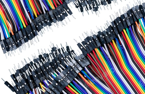 Preview: Ribbon cable or multi-wire planar cable on white background. Flat ribbon cable with pin connectors.