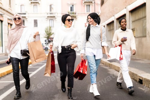 Preview: Friends enjoying a shopping spree in the city