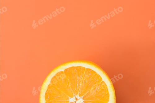 Preview: Top view of a one orange fruit slice on bright background in orange color. A saturated citrus te
