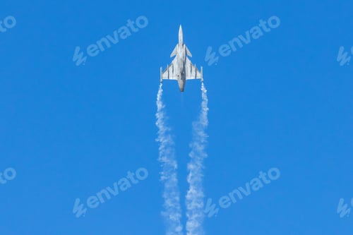 Preview: Fighter Jet Climbing with Vapor Trail in Sky