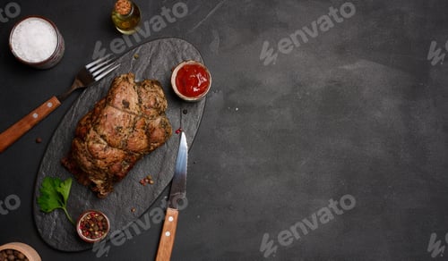 Preview: Baked pork collar with spices on a wooden board, delicious and juicy meat