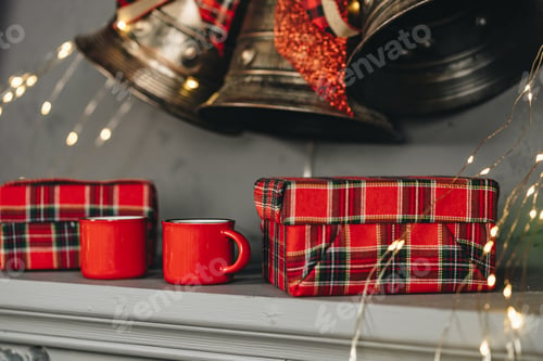Preview: Christmas gift box and two cups of hot coffee set on table