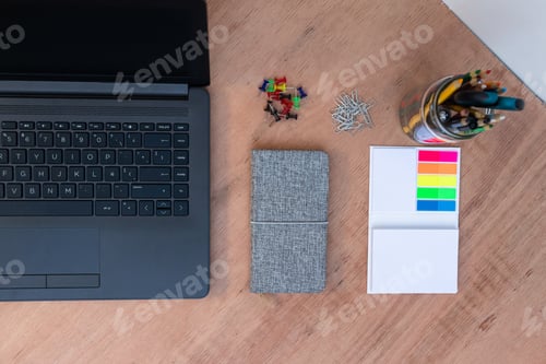 Preview: Office supplies and a laptop on a desk to work from home because of Covid-19