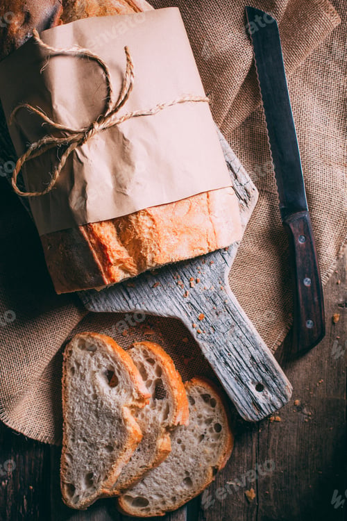 Preview: Rustic bread loaf on dark background