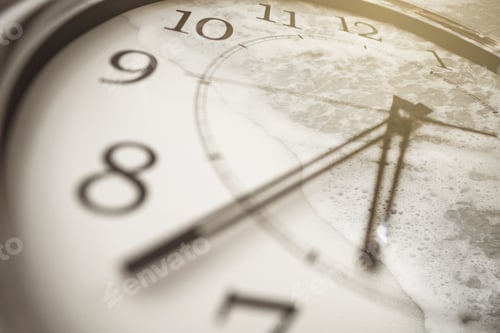 Preview: Close-up of the clock and sea wave on the sand.