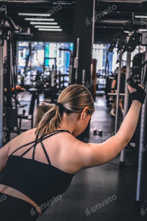 Preview: Gym.Fitness woman working out in the gym, doing exercises for health and beautiful figure.fitness in