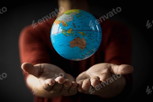 Preview: Globe floating above the hand