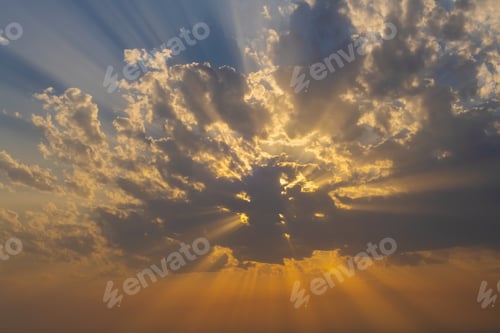 Preview: Dramatic sunset sun rays through the clouds
