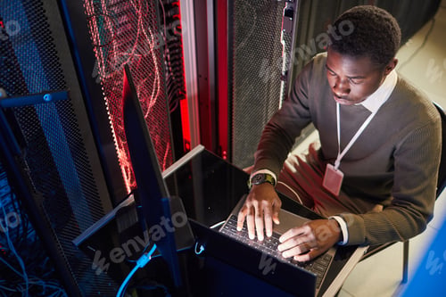 Preview: IT Technician Managing Server Room Equipment