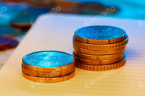 Preview: Close up of coins stacked on each other