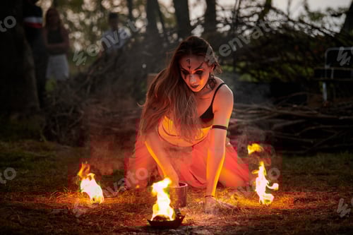 Preview: Girl fire dancing performance at outdoor art festival, smooth movements of female artist