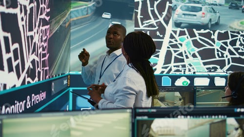 Preview: African american team monitoring routes and directions on satellite map
