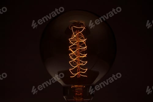 Preview: Close up vintage glowing light bulb