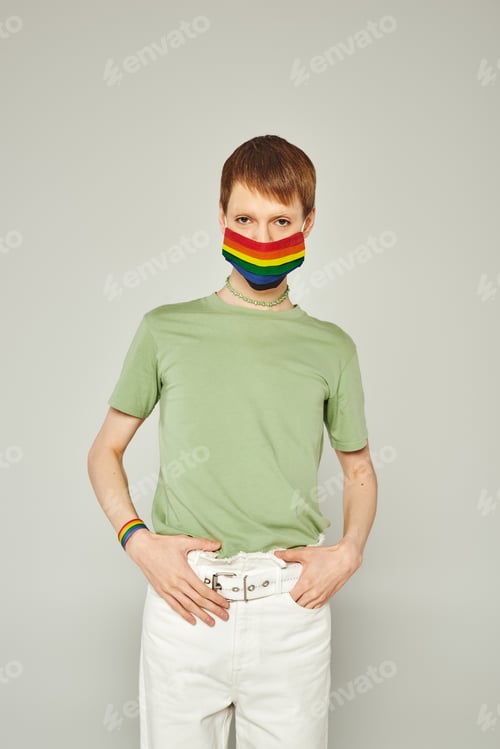 Preview: Person Wearing Rainbow Mask in Studio Setting
