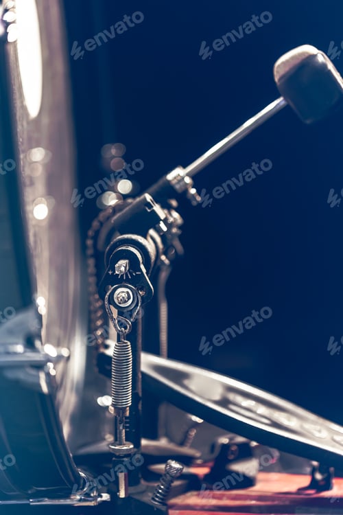 Preview: Bass drum with pedal, musical instrument on black background.