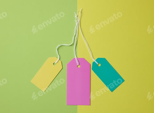 Preview: Empty paper tags on a rope, green background. Price template