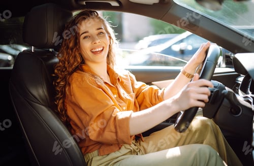Preview: Stylish woman driving car. Traveler is the driver. Automobile travel. Sharing car. Lifestyle concept
