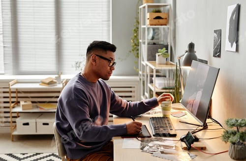 Preview: Male Photo Retoucher at Workplace