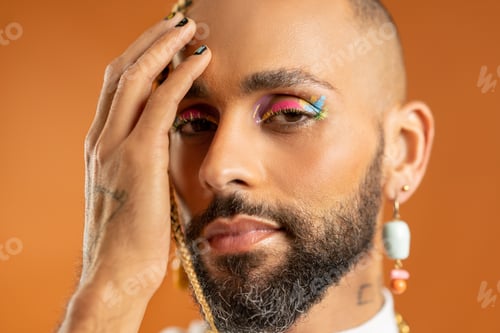 Preview: Black latin gay man isolated on pink background