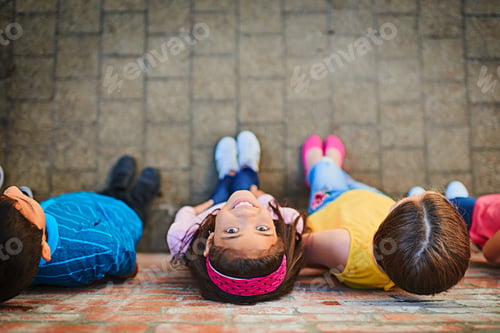 Preview: Looking up to a brighter future. Shot of a group of children outside.