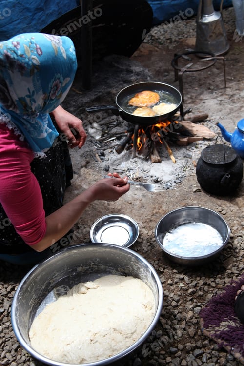Preview: frying dough in wood fire