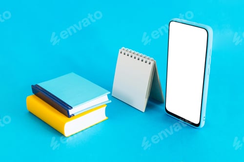 Preview: Blank calendar, notebook, and smartphone, on light blue background - e-learning concept