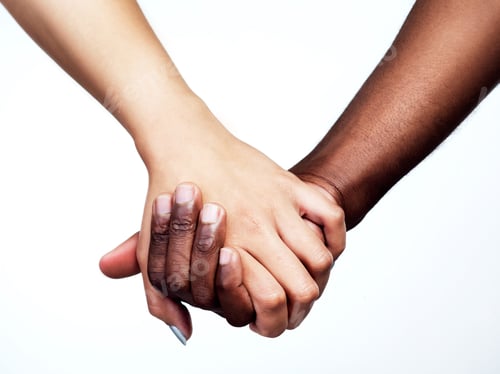 Preview: Unity is power. Studio shot of two unrecognizable people holding hands against a grey background.
