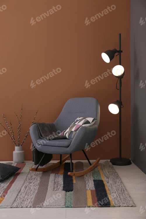 Preview: Modern living room interior with comfortable rocking chair and beautiful carpet