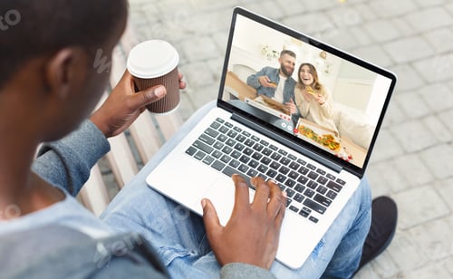 Preview: African guy having video call with his caucasian friends couple