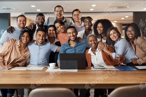 Preview: Shot of a group of young businesspeople using a laptop at a conference in a modern office