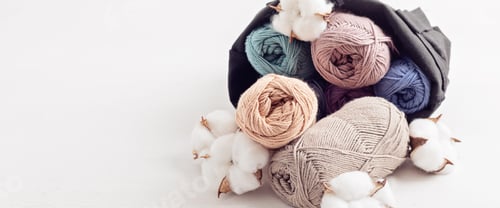 Preview: Craft hobby background with yarn in natural colors