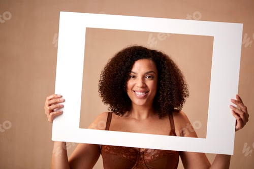 Preview: Studio Shot Of Confident Natural Woman In Underwear Promoting Body Positivity In Picture Frame